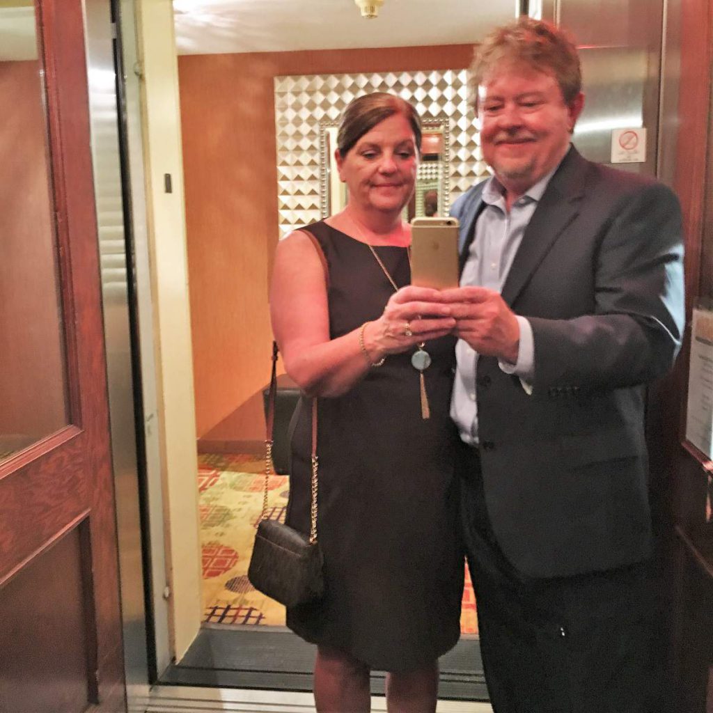 Greg and Pam selfie in elevator mirror at Hotel Highlands