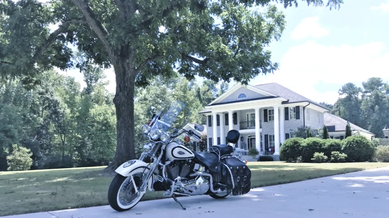 Harley Davidson Heritage Springer in the driveway in front of my home