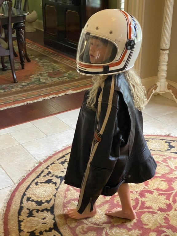 Kynzley wearing Papa's motorcycle gear