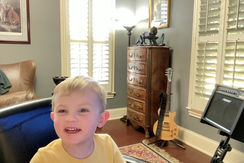 Fletcher taking selfies with photo booth on Papa's Mac