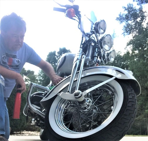 Greg restoring his old Harley in Arab, Alabama