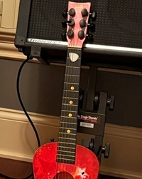 Fletcher's toy guitar